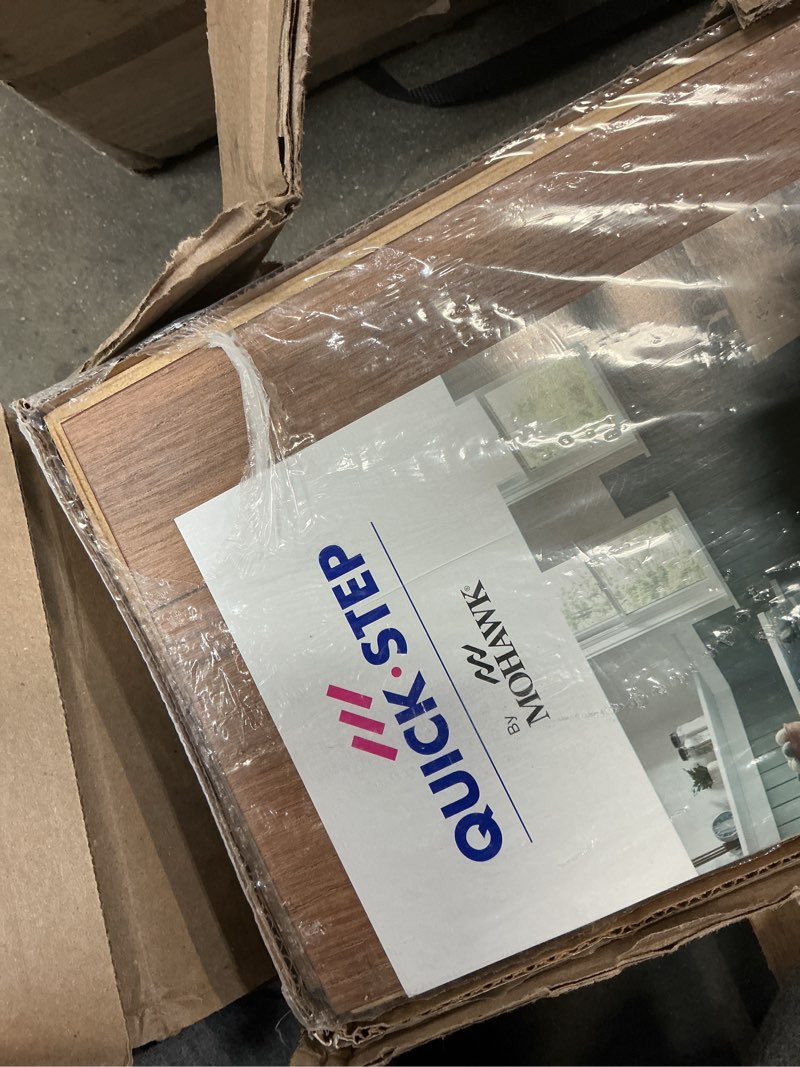 Condition photo showing As Is for quickstep by mohawk longview chestnut waterproof laminate flooring, 17.18 sq. ft. per box