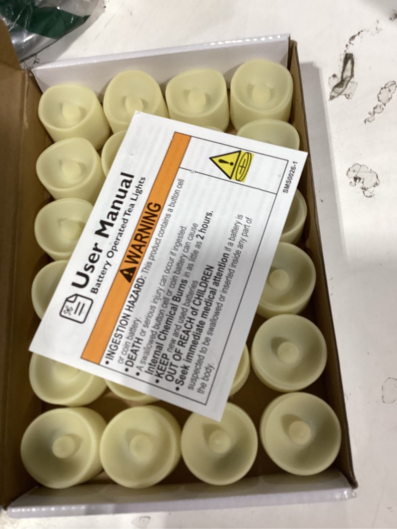 Condition photo showing Good Condition for homemory 24-pack flameless led tea lights candles battery operated, 200+hour fake electric candles tealights for votive, aniversary, wedding centerpiece table decor, funeral, halloween, christmas warm white glow – ivory body pack of 24