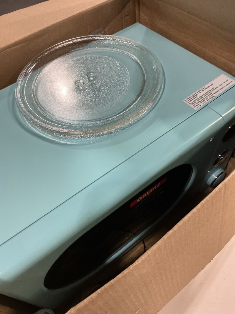 Condition photo showing As Is for galanz glcmka07ber-07 retro microwave oven, led lighting, pull handle design, child lock, bebop blue, 0.7 cu ft blue .7 cu ft classic microwave oven