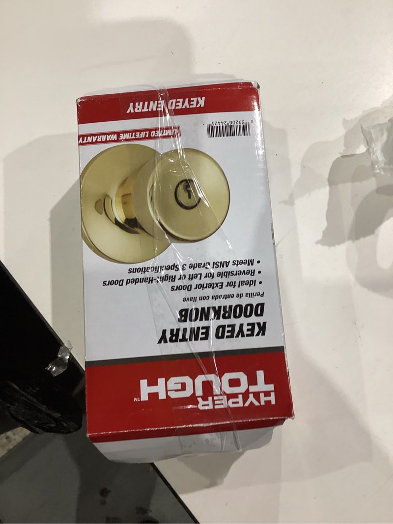 Condition photo showing As Is for hyper tough keyed entry tulip style doorknob, polished brass