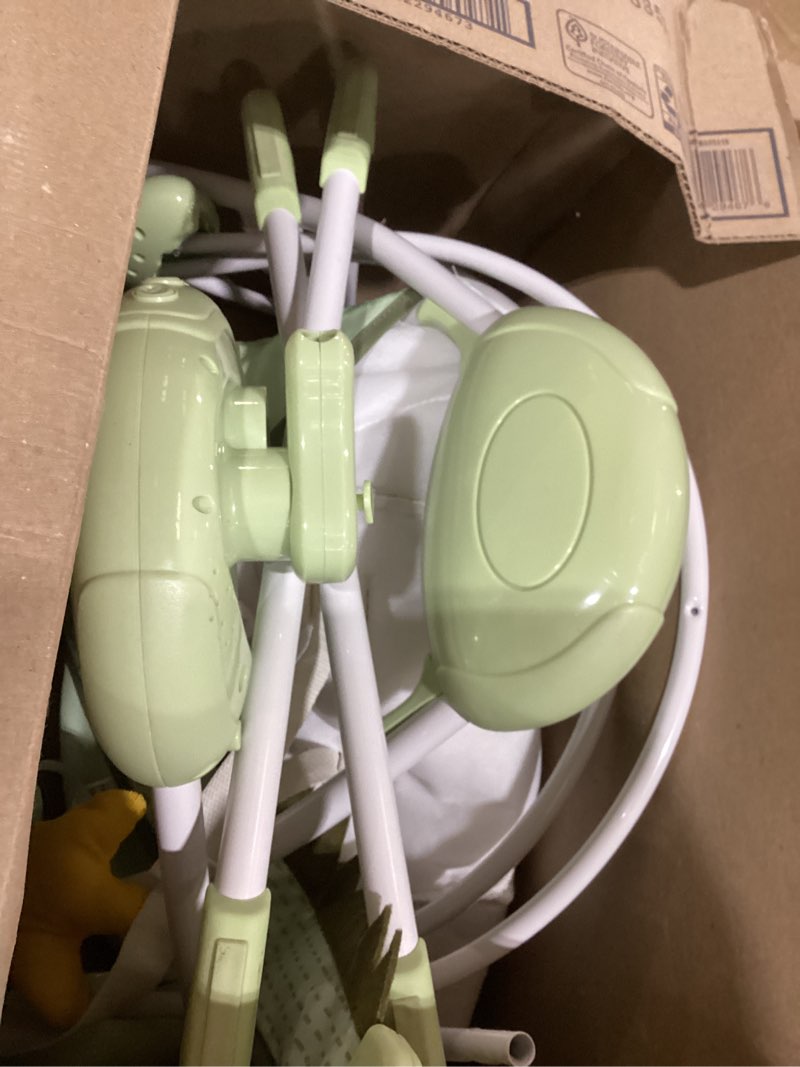 Condition photo showing As Is for baby swings for infants, portable baby swing with adaptable speed, music and timer, infant swing for babies 0-9 months 6-20 lbs, indoor/outdoor use little crocodile