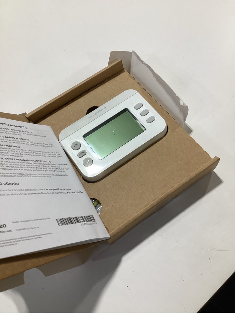 Condition photo showing As Is for new! honeywell home programmable thermostat, single-stage, 1 heat/1 cool compatibility, 5-2 day schedule, x2p, white, rth20b
