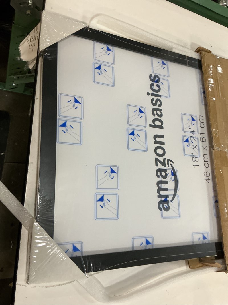 Condition photo showing Good Condition for amazon basics rectangular wood poster frame, 18" x 24", black