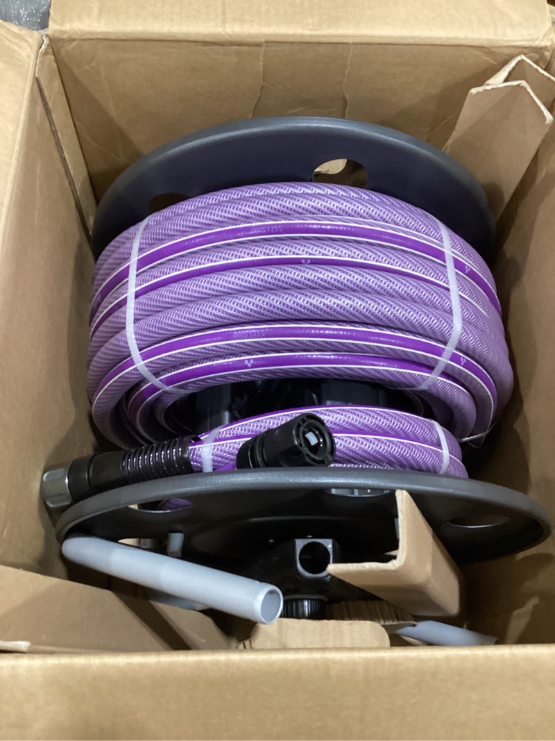 Condition photo showing Good Condition for yunigo freedom portable and wall-mountable garden hose reel equipped, kink-free hybrid hose, lightweight, easy setup. spray nozzle and leader hose include