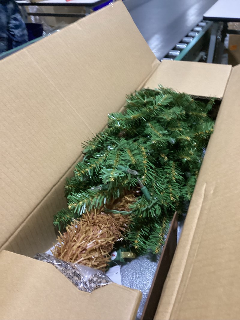 Condition photo showing As Is for National Tree Company 5 ft Pre-Lit Hickory Cedar Artificial Christmas Tree, 150 Clear Lights, 371 Tips, Metal Plate Base, Green 5ft Tree