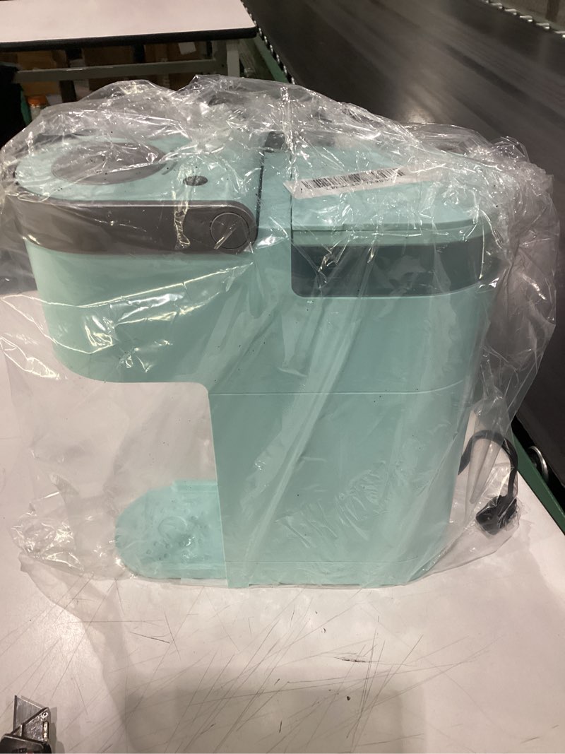 Condition photo showing As Is for keurig k-mini single serve coffee maker, oasis