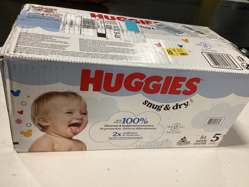 Condition photo showing New/Like New for Huggies Size 5 Diapers, Snug & Dry Baby Diapers, Size 5 (27+ lbs), 84 Count, Packaging May Vary Size 5 84