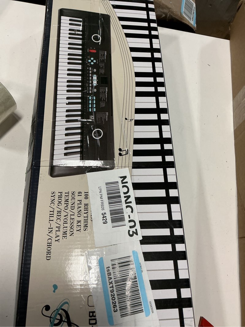 Condition photo showing New/Like New for 61 key keyboard piano, portable electronic digital piano, built in dual speakers, external microphone, power plug, rich teaching content, multi-functional electronic piano suitable for beginners