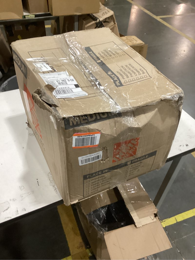Condition photo showing As Is for this item is a compact countertop microwave oven, appearing to be a 0.7 cu. ft. model with 700 watts of power.  
