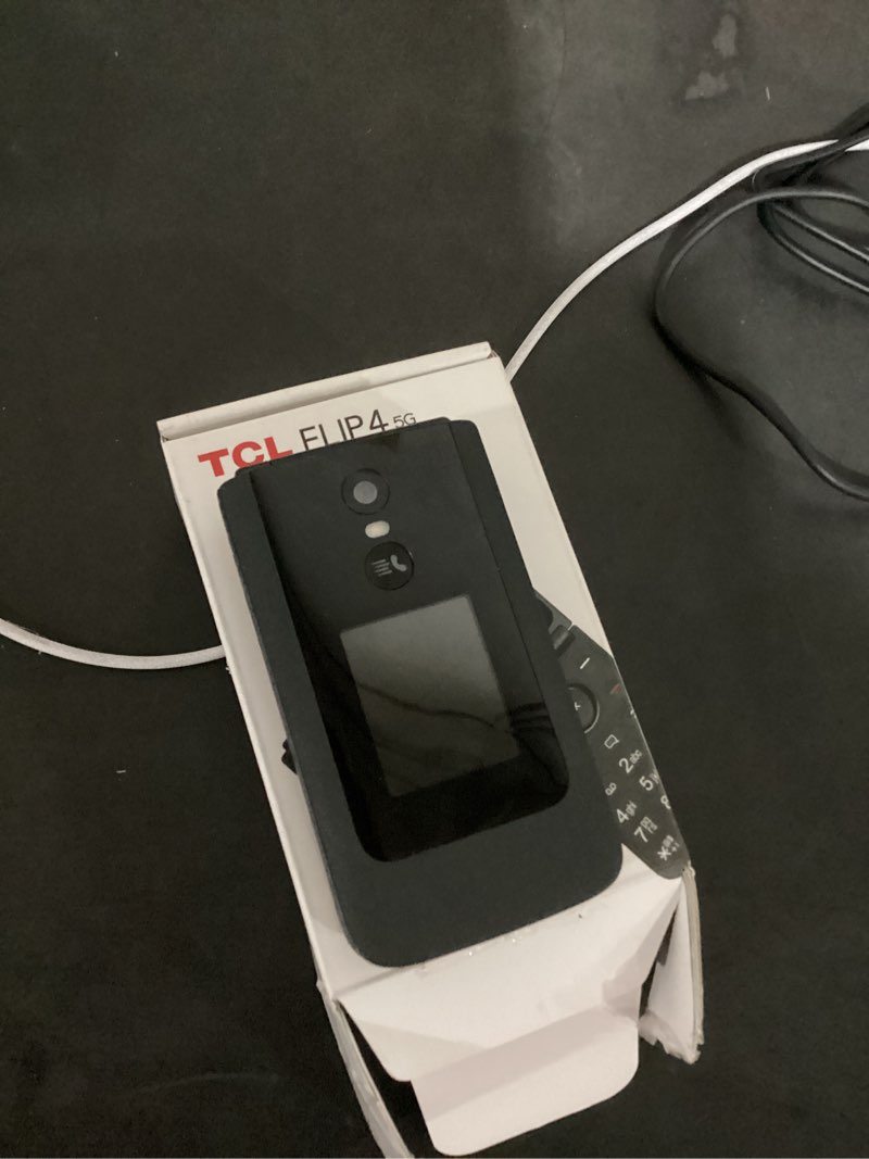 Condition photo showing As Is for doesnt power on metro by t-mobile tcl flip 4, gray,