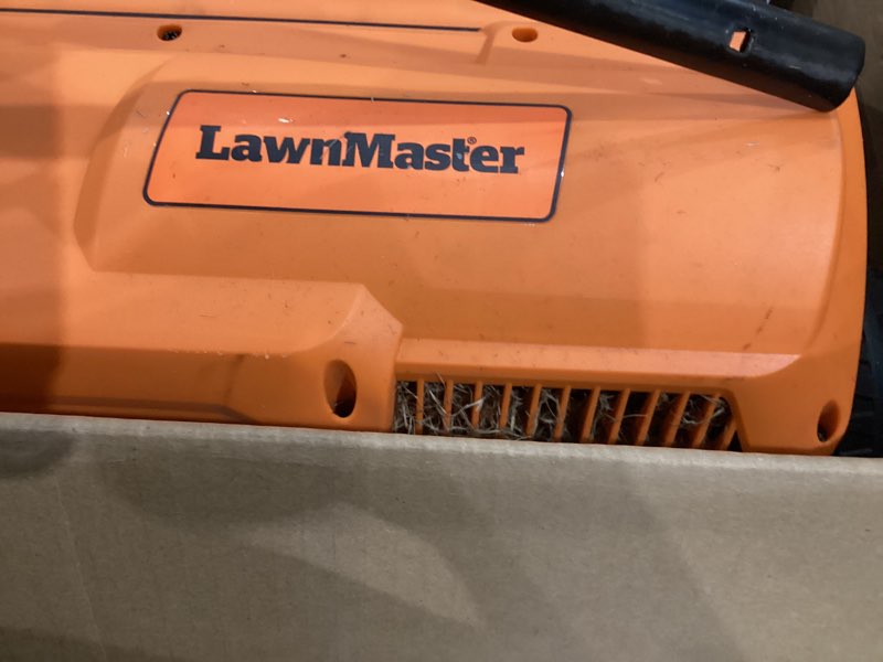 Condition photo showing As Is for lawnmaster gvb1316 electric 16” 13 amp dethatcher and scarifier with 12 gallon collection bag