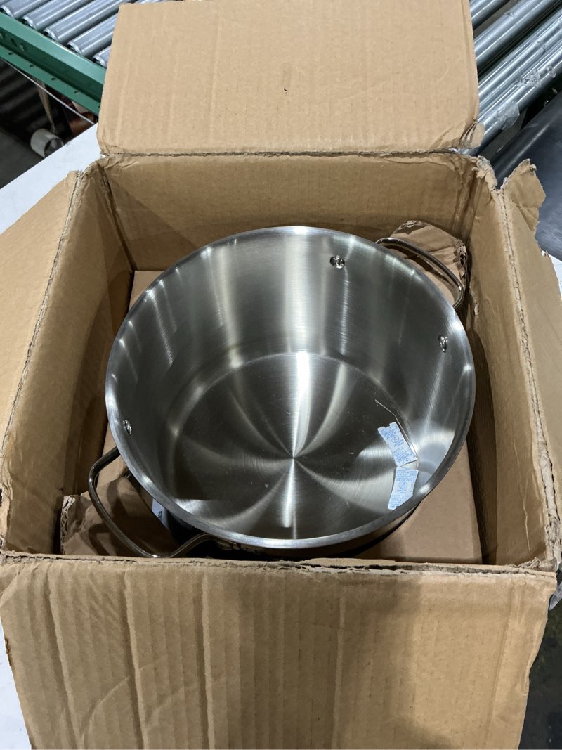 Condition photo showing As Is for amazon basics stainless steel induction compatible stock pot with glass lid, oven safe, dishwasher safe, sturdy, 8 quart, silver