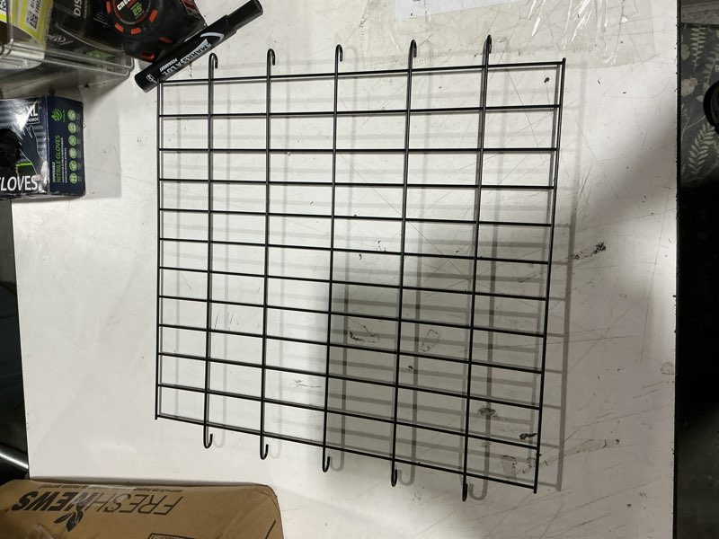 Condition photo showing New/Like New for assorted puppy supplies (grass puppy pee pad & small dog cage divider panel)