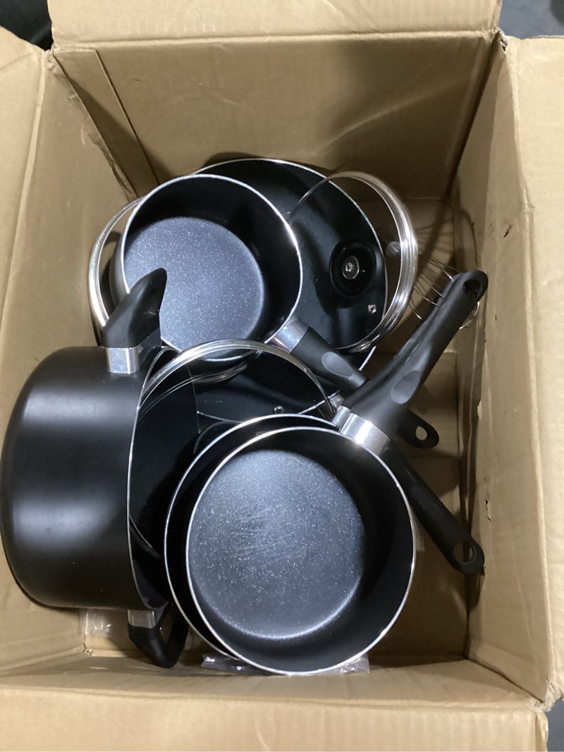 Condition photo showing As Is for amazon basics non stick kitchen cookware 8-piece set, non-induction, includes pots and pans, black
