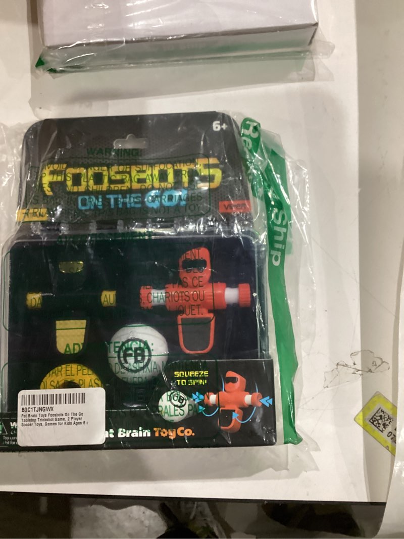 Condition photo showing New/Like New for Fat Brain Toys Foosbots On The Go Tabletop Trickshot Game, 2 Player Soccer Toys, Games for Kids Ages 6+