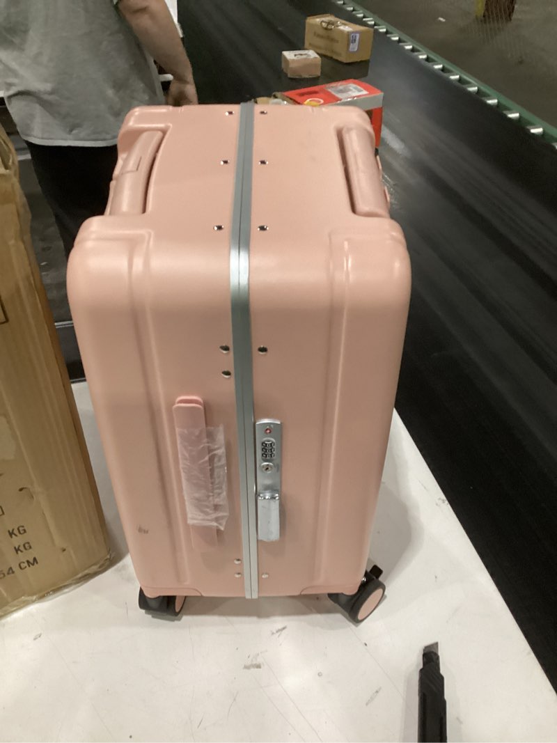 Condition photo showing As Is for pink rolling luggage