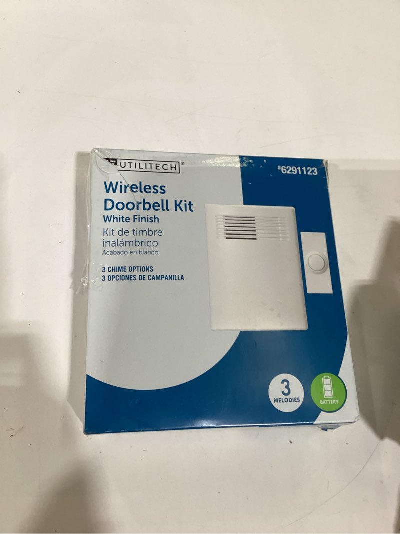 Condition photo showing As Is for utilitech white wireless doorbell kit partial