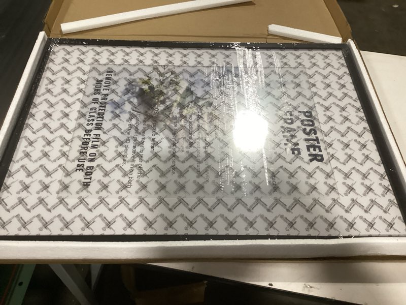 Condition photo showing Good Condition for A1 Poster Frame,23.4x33.1in Black Picture Frames with Polished Plexiglass,Easy to Hang,Display Picture A1 without Mat or A2 with Mat for Wall Mounting Horizontally and Vertically A1(23.4X33.1 Inch) Black