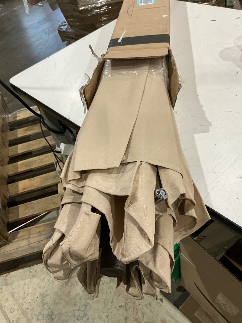 Condition photo showing Good Condition for jearey 9ft outdoor patio umbrella outdoor table umbrella with push button tilt and crank, market umbrella 8 sturdy ribs uv protection waterproof for garden, deck, backyard, pool (beige) 9ft beige