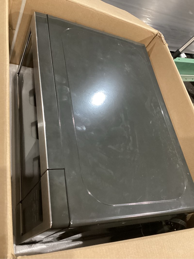 Condition photo showing Good Condition for ge - 0.7 cu. ft. countertop microwave with convenience cooking control - black stainless steel