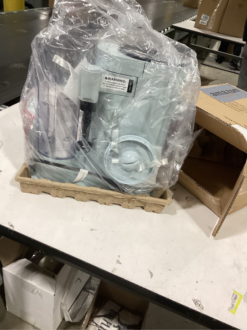 Condition photo showing Good Condition for Ninja Pods & Grounds Specialty Single-Serve Coffee Maker, K-Cup Pod Compatible, Built-In Milk Frother, 6-oz. Cup to 24-oz. Travel Mug Sizes, Iced Coffee Maker, Glacier Blue, PB051GB