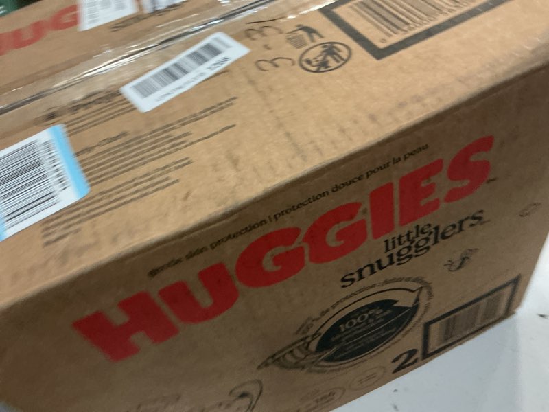 Condition photo showing New/Like New for huggies size 2 diapers, little snugglers baby diapers, size 2 (12-18 lbs), 186 count (3 packs of 62), packaging may vary