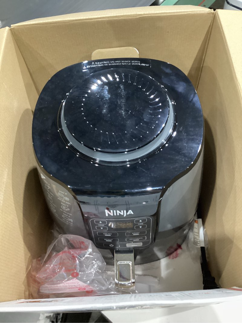 Condition photo showing Good Condition for ninja air fryer | 4 qt capacity | 4-in-1 roast, crisp, roast, reheats, & dehydrates | dishwasher safe parts | 105°f-400°f | includes 20 easy & healthy recipes | 1550 watt | grey | af101
