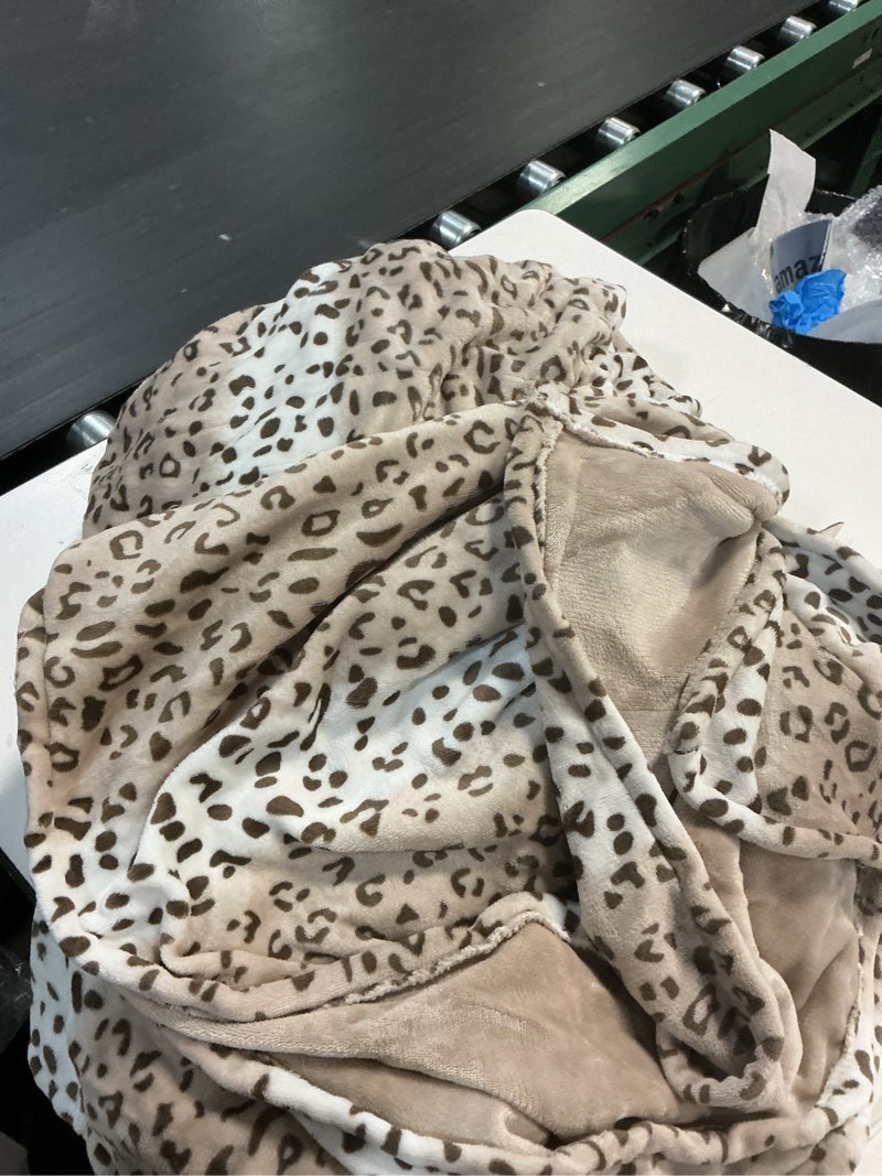 Condition photo showing As Is for westinghouse heated throw blanket, grey leopard electric throw blanket, luxury faux fur to flannel reversible, 6 heating levels & 2-10 hours time setting, machine washable(throw, 50"x60") greyleopard throw 50"x60"
