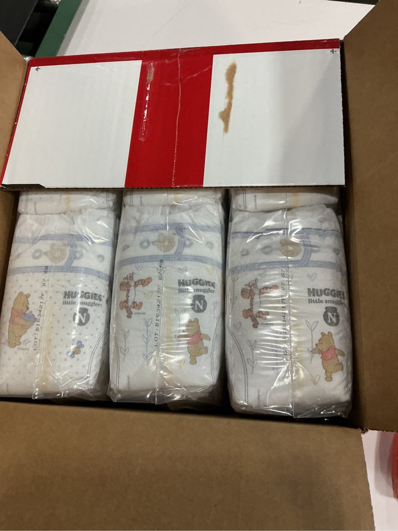 Condition photo showing New/Like New for Huggies Size Newborn Diapers, Little Snugglers Baby Diapers, Size Newborn (up to 10 lbs), 144 Count, Packaging May Vary