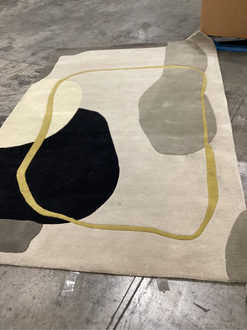 Yellow black and cream rug