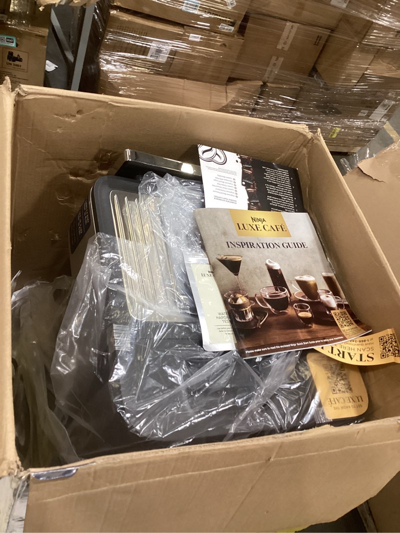 Condition photo showing As Is for ninja luxe cafe premier series, espresso machine, drip coffee, rapid cold brew, integrated grinder, hands-free frother, with knock box, water filter, cleaning tablets, descaler, es601gm luxe cafe gunmetal