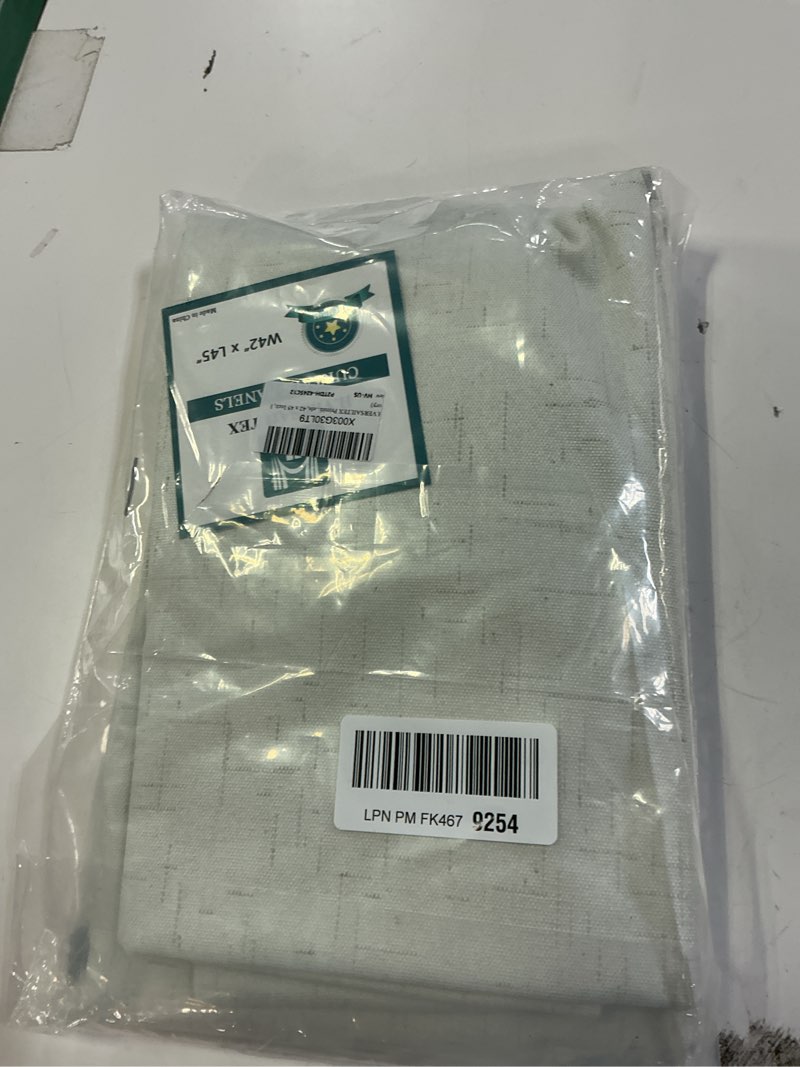 Condition photo showing item condition for H.VERSAILTEX Primitive Linen Curtains 100% Blackout Curtain Drapes Burlap Fabric Curtains with White Thermal Insulated Liner, Grommet Top Drapes Living Room/Bedroom (2 Panels, 42 x 45 Inch, Ivory) Ivory 42"W x 45"L (Pack of 2)