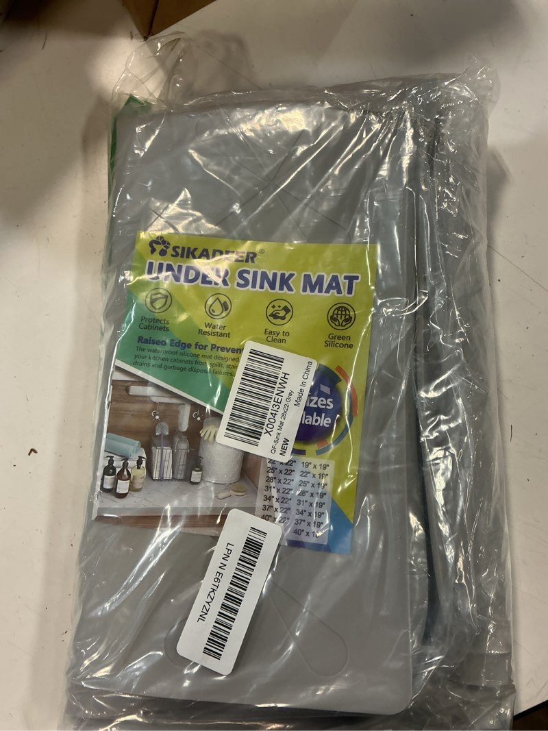 Condition photo showing Good Condition for sikadeer 28" x 22" under sink mat waterproof, silicone mat kitchen drawer shelf and cabinet liner, sink protector for kitchen organizers and storage, boot tray pet food mats gray 28"w x 22"l