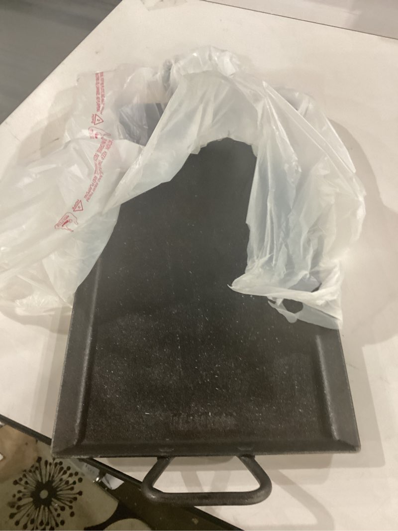 Condition photo showing Good Condition for lodge 18 inch pre-seasoned carbon steel griddle - unparalleled heat retention - use in the oven, on a gas stove, on the grill, or over a campfire - black