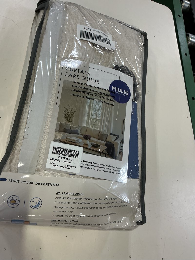 Condition photo showing Good Condition for miulee 2 panels solid color sheer window curtains elegant window voile panels/drapes/treatment for bedroom living room (54x90 inches ivory) ivory solid 54"w x 90"l (pack of 2)