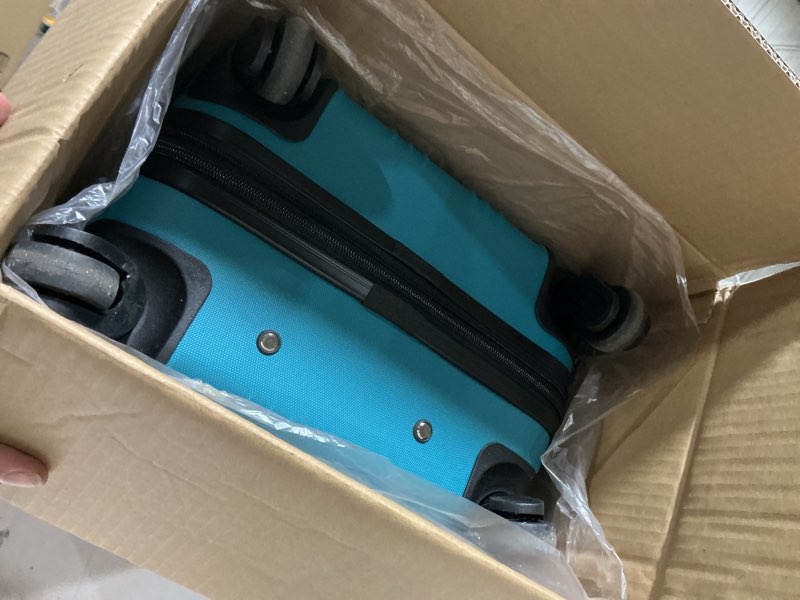 Condition photo showing New/Like New for travelers club chicago hardside expandable spinner luggage, teal, 22" carry-on 22" carry-on teal