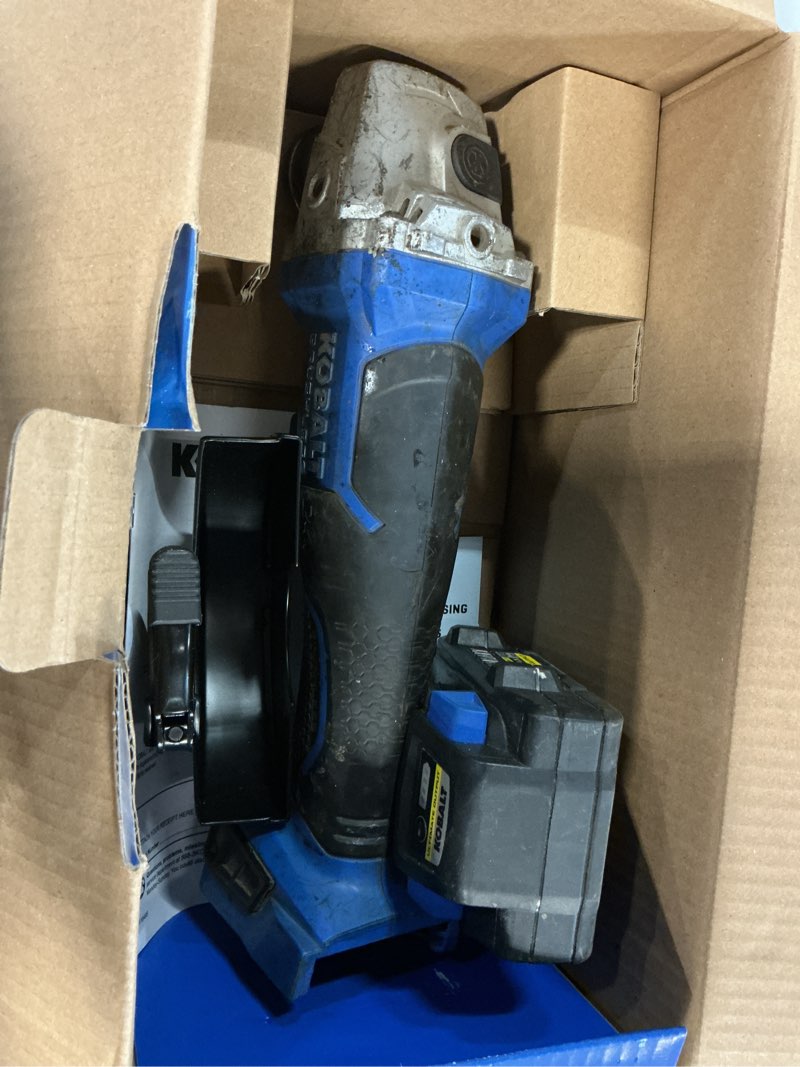 Condition photo showing As Is for kobalt 5-in 24-volt paddle switch brushless cordless angle grinder (battery and charger not included)