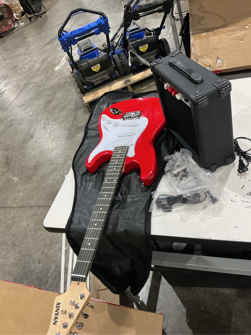 Condition photo showing Good Condition for 39in full size beginner electric guitar starter kit w/case, strap, 20w amp, strings, pick, tremolo bar (red guitar)