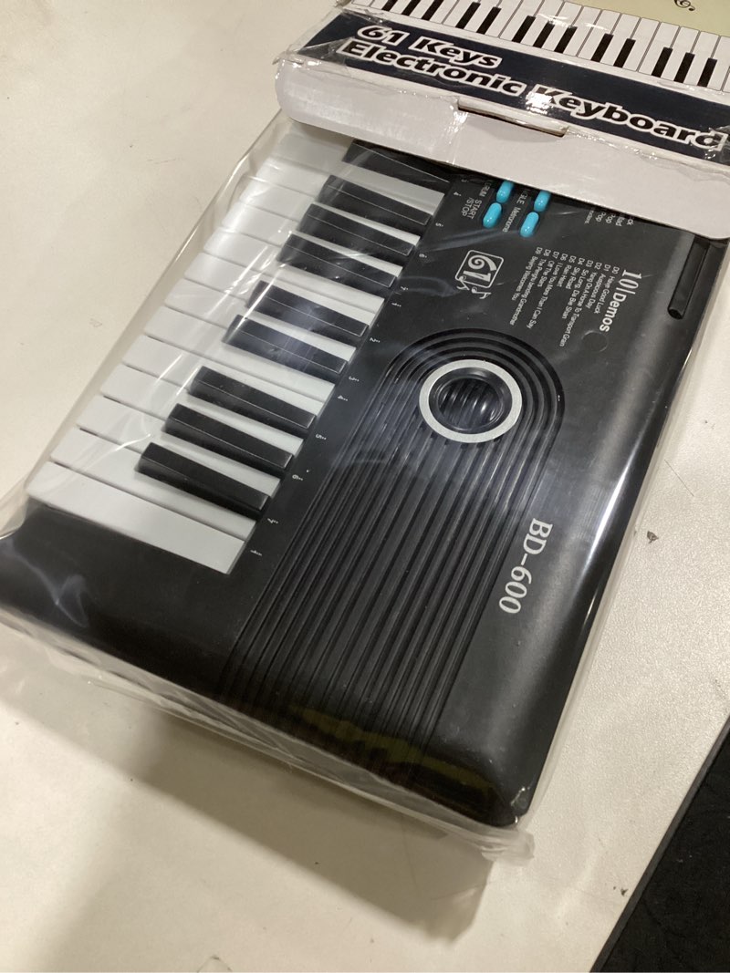 Condition photo showing Good Condition for Raimy Piano Keyboard for Beginners, 61 Keys Portable Electronic Digital Piano with Microphone, Learning Educational Music Keyboard Piano for Kids Gifts Toys for Boys Girls Toddlers (Black)