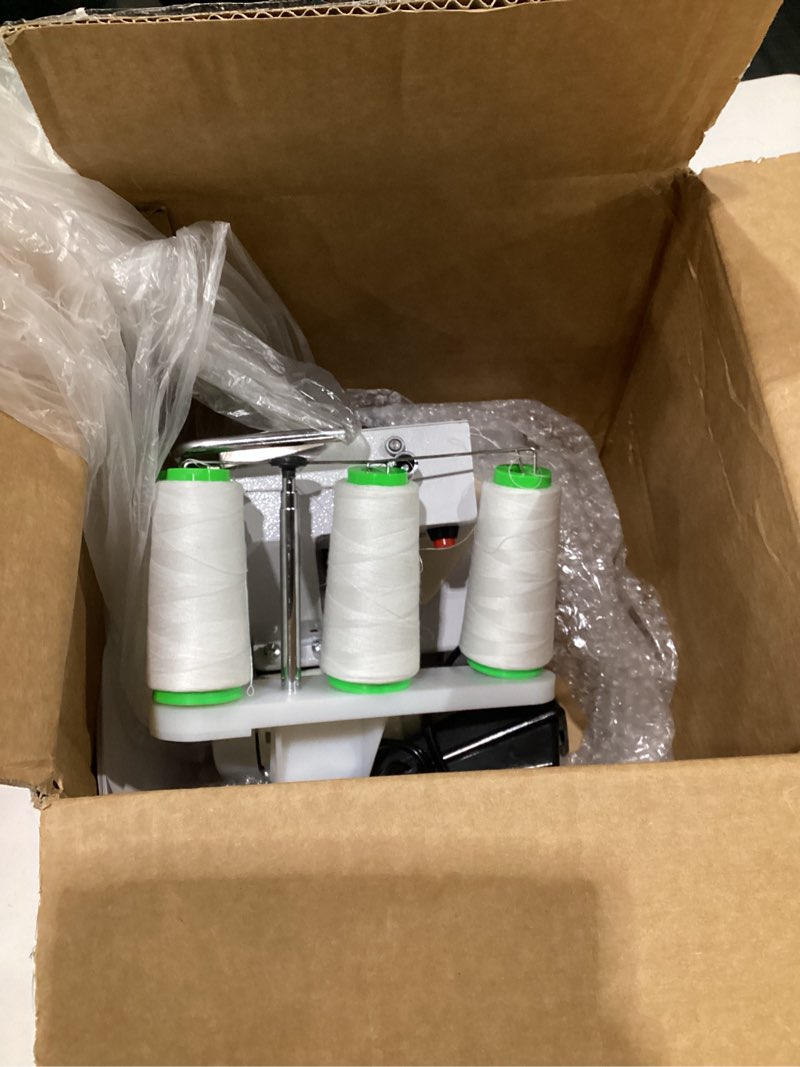 Condition photo showing As Is for Brother Serger, 1034D, Heavy-Duty Metal Frame Overlock Machine, 1,300 Stitches Per Minute, Removeable Trim Trap, 3 Included Accessory Feet, White, SIMILAR TO STOCK PHOTOS, NOT EXACT