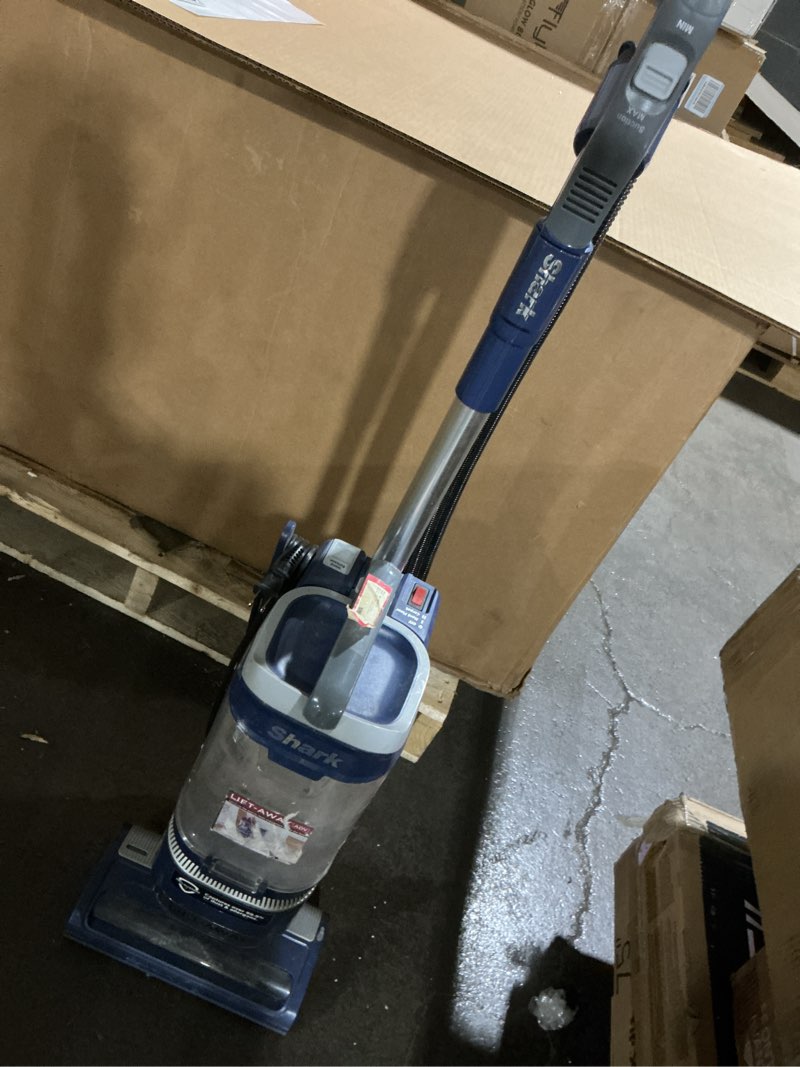 Condition photo showing As Is for (powers on) shark navigator lift-away adv upright vacuum with hepa filter, powerful pet hair pickup, advanced swivel steering, lightweight versatility, for carpets & hard floors, blue jean, la301