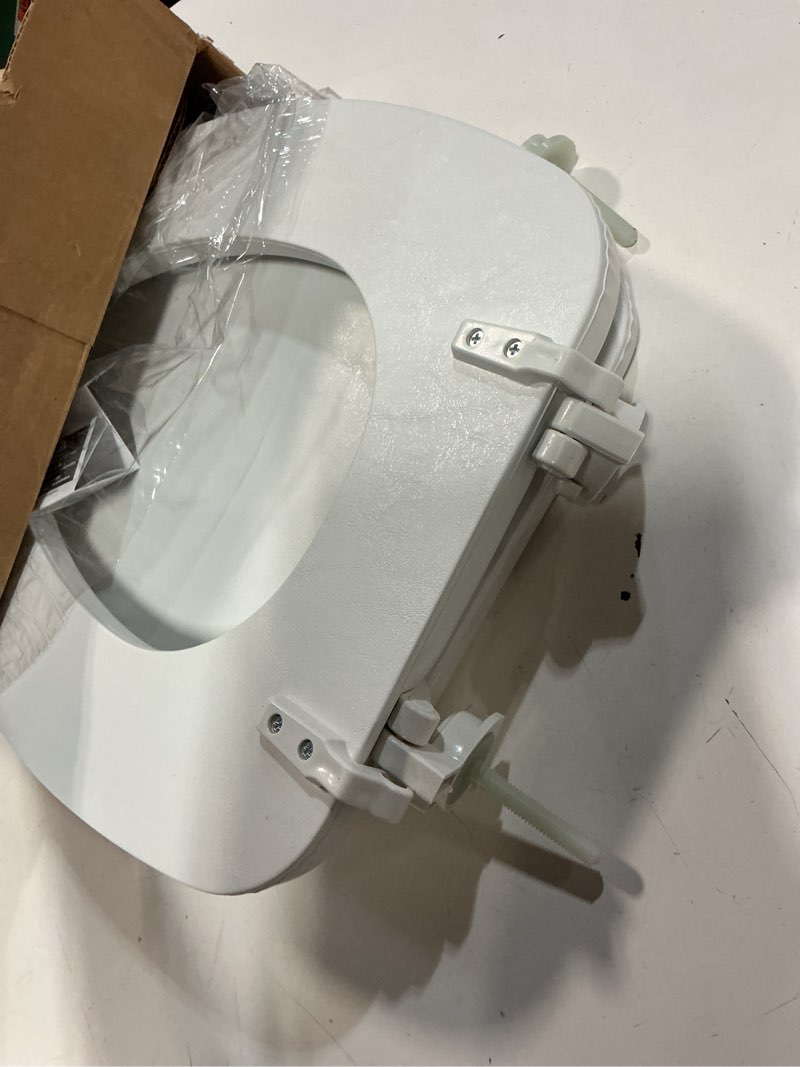 Condition photo showing As Is for mayfair padded toilet seat, cushioned soft vinyl over wood core seat, secure hinges, easy clean, elongated, white elongated white toilet seat
