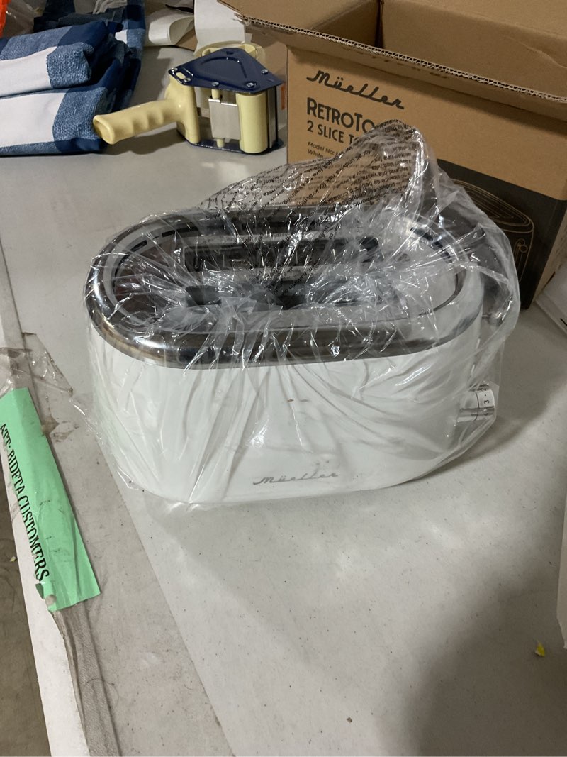 Condition photo showing Good Condition for mueller home retro toaster 2 slice, 7 browning levels, 3 functions (reheat, defrost, cancel), stainless steel features, removable crumb tray, under base cord storage, white toaster kitchen appliances