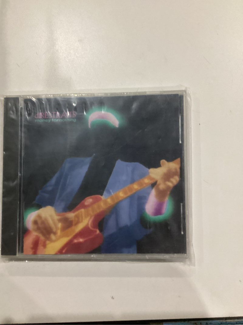 Condition photo showing New/Like New for Dire Straits - Money For Nothing