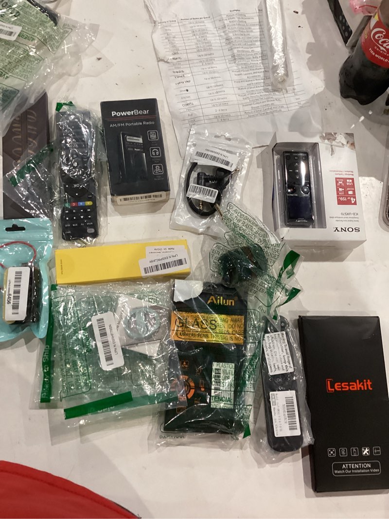 assorted lot of electronics (headphones, small gadgets, headsets, etc.) 