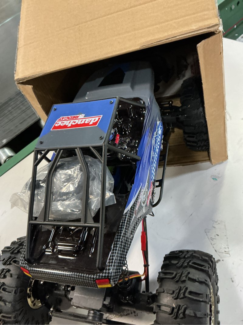 Condition photo showing Good Condition for Redcat Racing Danchee Ridgerock 1/10 Scale 4WD Electric RC Rock Crawler – RC Truck RTR with 2.4GHz Radio, Dual Motors, 4-Wheel Steering, USB Charger with RC Crawler Li-ion Battery