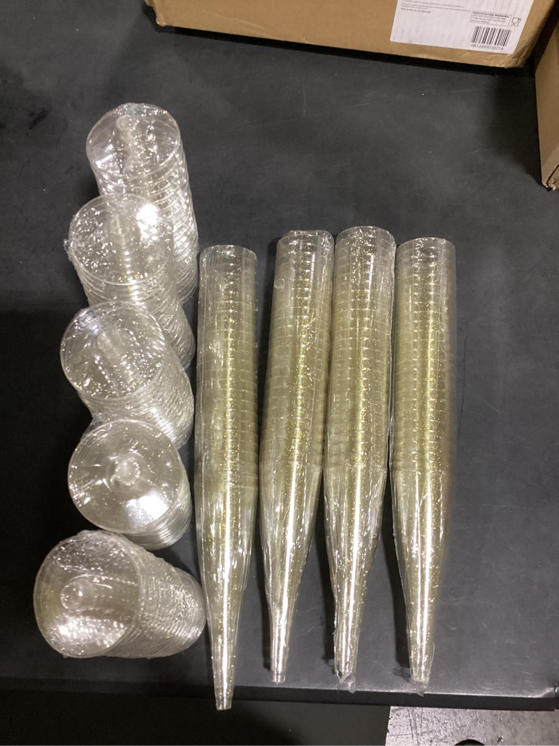 Condition photo showing Good Condition for Prestee 100 Gold Plastic Champagne Flutes - 4.5 oz Disposable Champagne Glasses for Toasting at Weddings, Mimosas, Cocktails, Great Gatsby Party Decorations, and Events Gold Glitter 100 Count (Pack of 1)