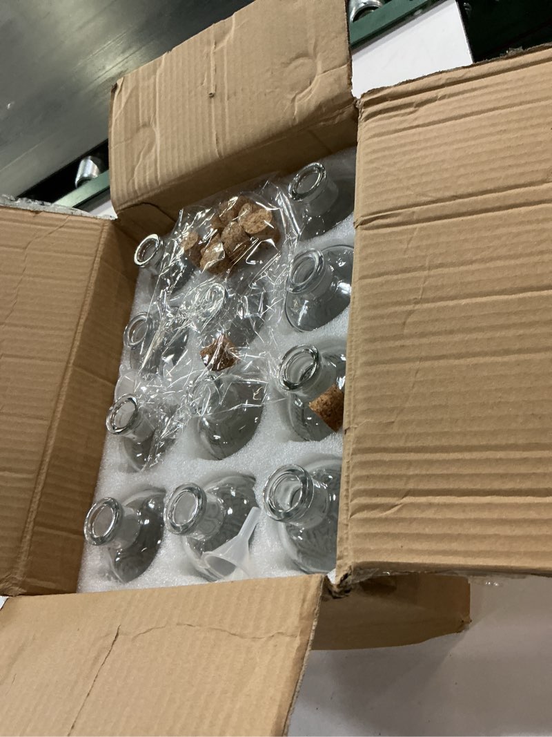 Condition photo showing New/Like New for 12 pack 6oz glass bottles with cork stoppers, 200ml clear glass liquor bottles with 4 vintage patterns, refillable whiskey bottles for wine, oil, vinegar, kombucha, wedding favors clear 4 patterns