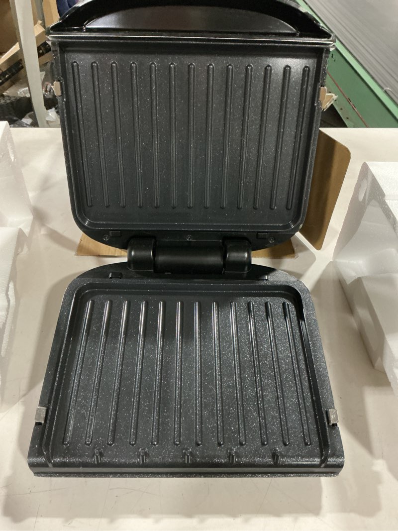 Condition photo showing Good Condition for george foreman family-size grill & panini press, nonstick ceramic coating, fat-removing slope, adjustable angle, indoor/outdoor use 5-serving