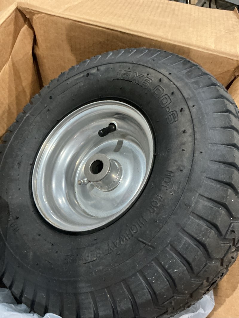 Condition photo showing As Is for set of 2 - 15x6.00-6 silver lawn mower replacement wheel - fits 3/4 inch axle